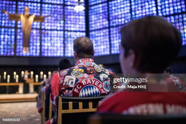 Fans of Bayern Muenchen attend Ecumencial Church Service prior DFB Cup Final 2018 on May 19, 2018 in the Kaiser Wilhelm Memorial Church in Berlin,...