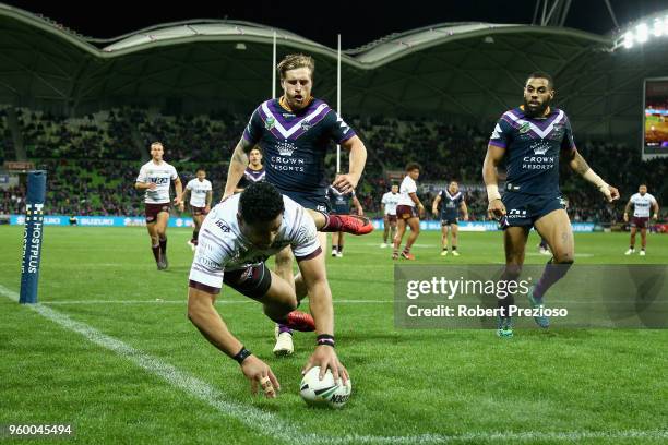 Matthew Wright of the Manly Sea Eagles crosses the line to score a try during the round 11 NRL match between the Melbourne Storm and the Manly Sea...