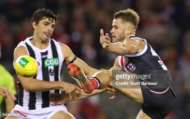 Scott Pendlebury of the Magpies and Maverick Weller of the Saints compete for the ball during the round nine AFL match between the St Kilda Saints...