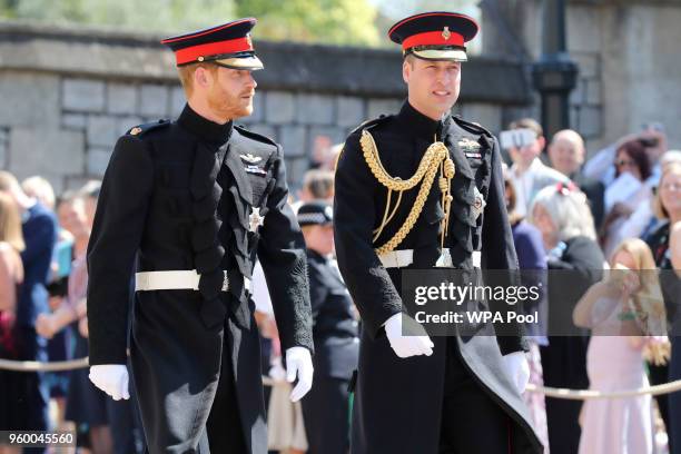 Prince Harry walks with his best man, Prince William, Duke of Cambridge as they arrive at St George's Chapel at Windsor Castle before the wedding of...