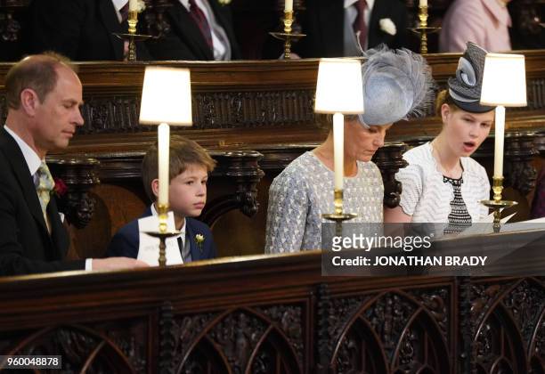 The Earl and Countess of Wessex and their children Lady Louise Windsor and James, Viscount Severn take their seats inside the Chapel ahead of the...