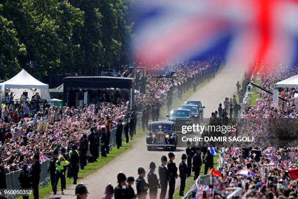 Meghan Markle and her mother, Doria Ragland, are driven along the Long Walk as they arrive for her wedding ceremony to marry Britain's Prince Harry,...