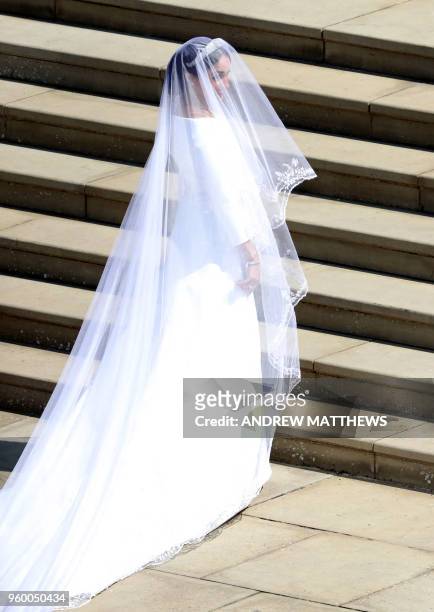 Actress Meghan Markle arrives for the wedding ceremony to marry Britain's Prince Harry, Duke of Sussex, at St George's Chapel, Windsor Castle, in...