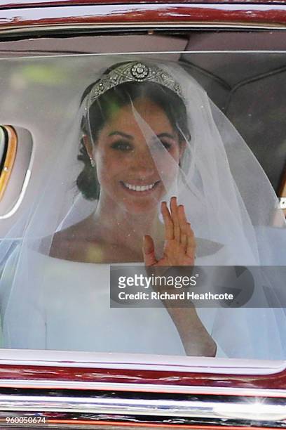 Meghan Markle drives down the Long Walk as they arrive at Windsor Castle ahead of her wedding to Prince Harry on May 19, 2018 in Windsor, England.