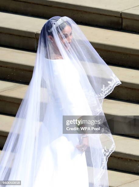 Meghan Markle arrives for her wedding to Prince Harry at St George's Chapel, Windsor Castle on May 19, 2018 in Windsor, England.