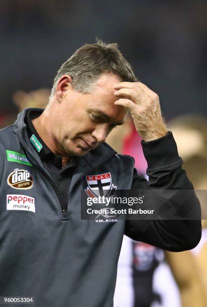 Alan Richardson, coach of the Saints reacts after speaking to his team during a quarter time break during the round nine AFL match between the St...