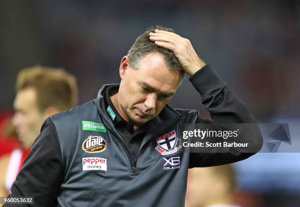 Alan Richardson, coach of the Saints reacts after speaking to his team during a quarter time break during the round nine AFL match between the St...