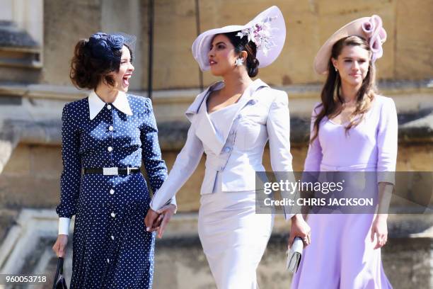 Actress Abigail Spencer and Bollywood actress Priyanka Chopra arrive for the wedding ceremony of Britain's Prince Harry, Duke of Sussex and US...