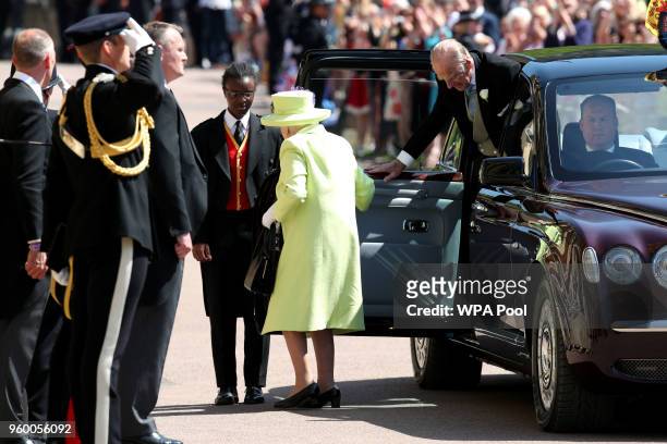 Queen Elizabeth II and the Prince Philip, Duke of Edinburgh arrive for the wedding ceremony of Britain's Prince Harry and US actress Meghan Markle at...