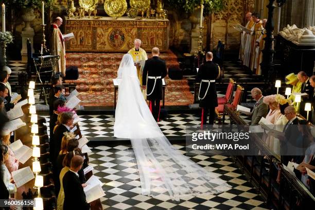 Prince Harry and Meghan Markle during their wedding ceremony in St George's Chapel at Windsor Castle on May 19, 2018 in Windsor, England.