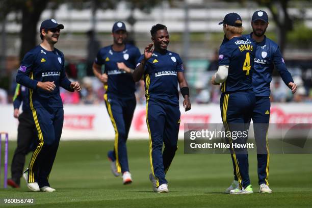 Fidel Edwards of Hampshire celebrates with team mates after dismissing Ben Brown of Sussex during the Royal London One-Day Cup match between Sussex...