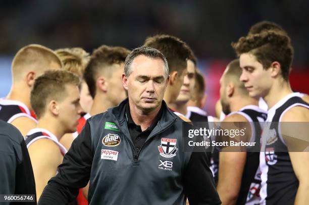 Alan Richardson, coach of the Saints reacts after speaking to his team during a quarter time break during the round nine AFL match between the St...