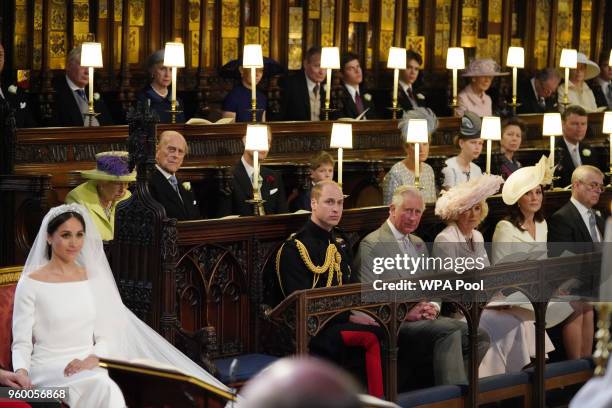 Meghan Markle in St George's Chapel, Windsor Castle for her wedding to Prince Harry watched by Queen Elizabeth II, Duke of Edinburgh, Earl of Wessex,...