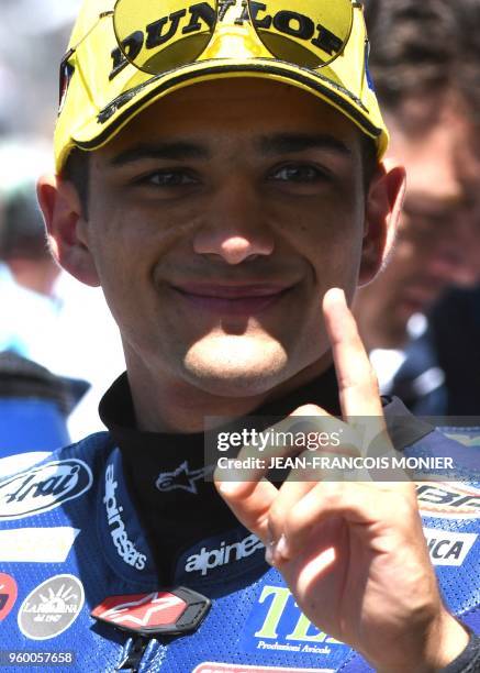 Honda Del Conca Gresini Moto3 Spanish's rider Jorge Martin reacts after he clocked the pole position during a Moto3 qualifying practice session,...