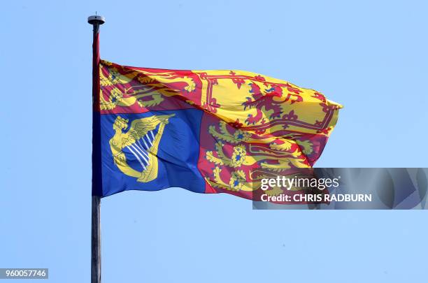 The Royal Standard is flown for the wedding ceremony of Britain's Prince Harry, Duke of Sussex and US actress Meghan Markle, at Windsor Castle, in...