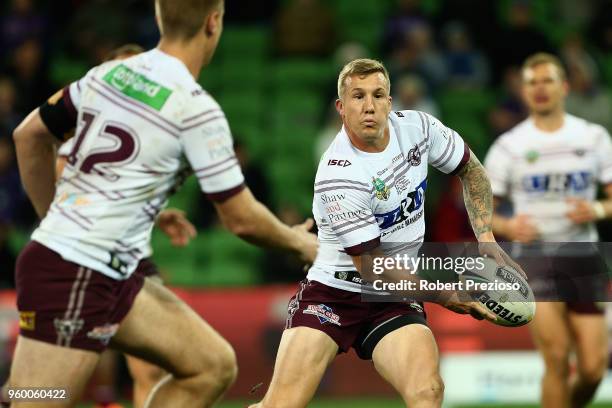 Trent Hodkinson of the Manly Sea Eagles Offloads the ball during the round 11 NRL match between the Melbourne Storm and the Manly Sea Eagles at AAMI...