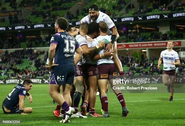 Moses Suli of the Manly Sea Eagles celebrates after crossing the line to score a try during the round 11 NRL match between the Melbourne Storm and...