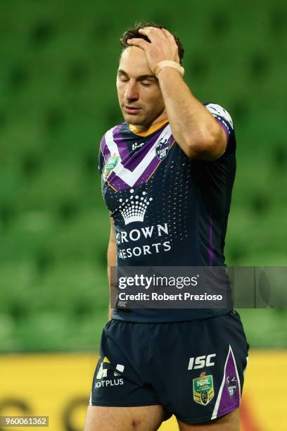 Billy Slater of the Melbourne Storm reacts during the round 11 NRL match between the Melbourne Storm and the Manly Sea Eagles at AAMI Park on May 19,...