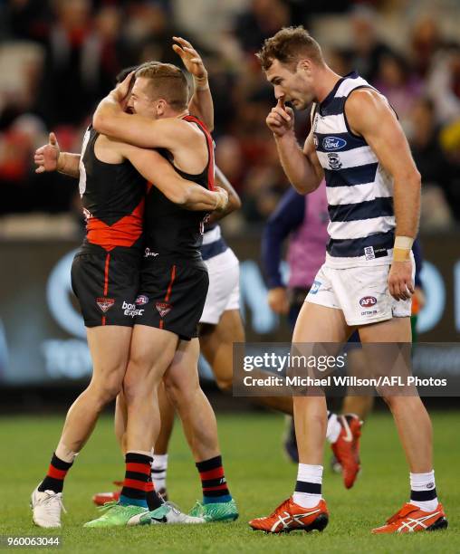 Orazio Fantasia and Devon Smith of the Bombers celebrate during the 2018 AFL round nine match between the Essendon Bombers and the Geelong Cats at...