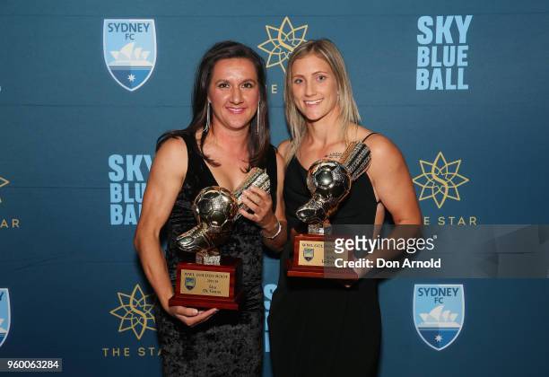 Lisa De Vann and Kylie Ledbrook pose with their WWL Golden Boot awards at the Sydney FC Sky Blue Ball on May 19, 2018 in Sydney, Australia.