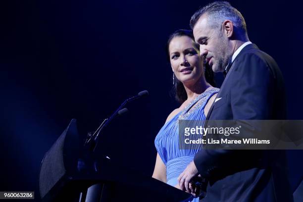 Hosts Stephanie Brantz and Simon Hill speak during the Sydney FC Sky Blue Ball on May 19, 2018 at The Star in Sydney, Australia.