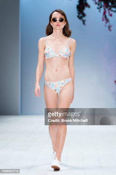 Model walks the runway during theResort Review show at Mercedes-Benz Fashion Week Australia - Weekend Edition at Carriageworks on May 19, 2018 in...