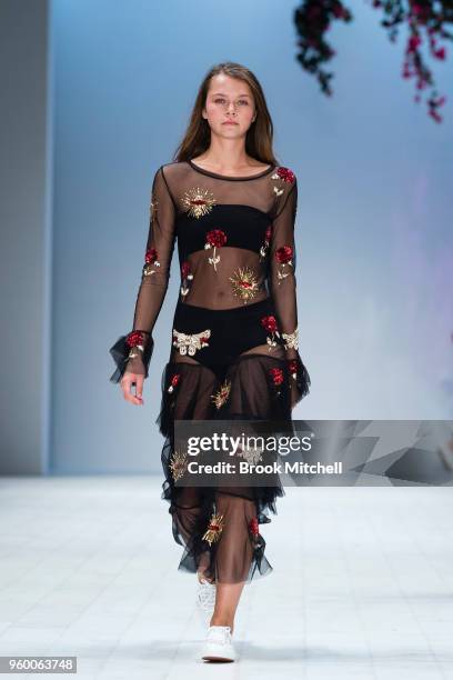 Model walks the runway during theResort Review show at Mercedes-Benz Fashion Week Australia - Weekend Edition at Carriageworks on May 19, 2018 in...