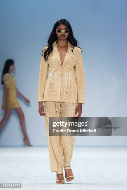 Model walks the runway during theResort Review show at Mercedes-Benz Fashion Week Australia - Weekend Edition at Carriageworks on May 19, 2018 in...