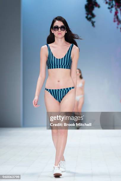 Model walks the runway during theResort Review show at Mercedes-Benz Fashion Week Australia - Weekend Edition at Carriageworks on May 19, 2018 in...