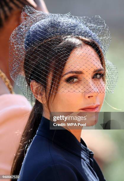 Victoria Beckham leaves St George's Chapel at Windsor Castle after the wedding of Prince Harry to Meghan Markle on May 19, 2018 in Windsor, England.