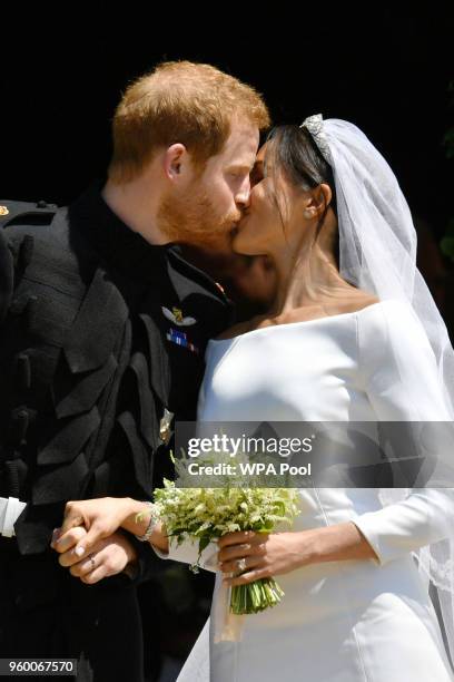 Prince Harry and Meghan Markle leave St George's Chapel through the west door after their wedding in St George's Chapel at Windsor Castle on May 19,...