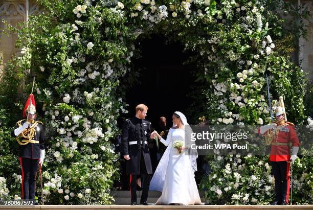 Prince Harry and Meghan Markle leave St George's Chapel through the west door after their wedding in St George's Chapel at Windsor Castle on May 19,...