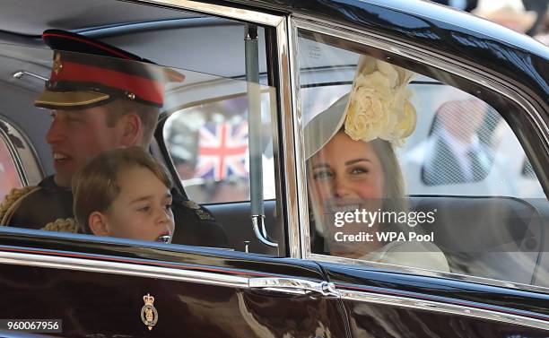 Prince William, Duke of Cambridge and Catherine, Duchess of Cambridge and Prince George leave St George's Chapel at Windsor Castle after the wedding...