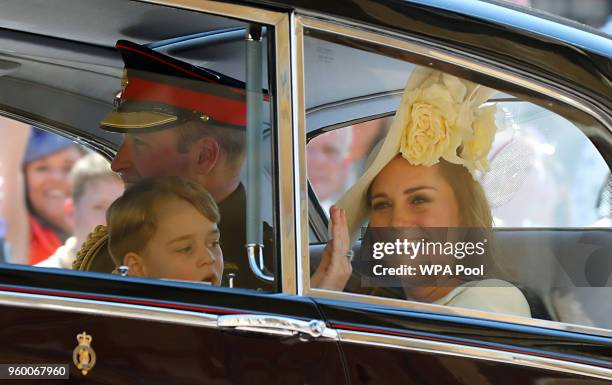 Prince William, Duke of Cambridge and Catherine, Duchess of Cambridge and Prince George leave St George's Chapel at Windsor Castle after the wedding...