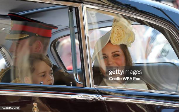 Prince William, Duke of Cambridge and Catherine, Duchess of Cambridge and Prince George leave St George's Chapel at Windsor Castle after the wedding...
