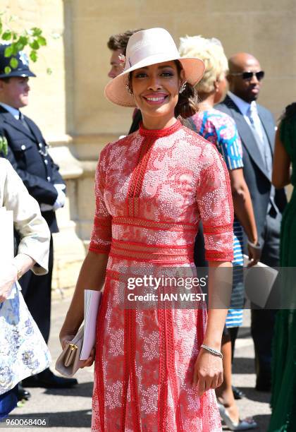 Meghan Markle's friend, US actress Gina Torres leaves after attending the wedding ceremony of Britain's Prince Harry, Duke of Sussex and US actress...