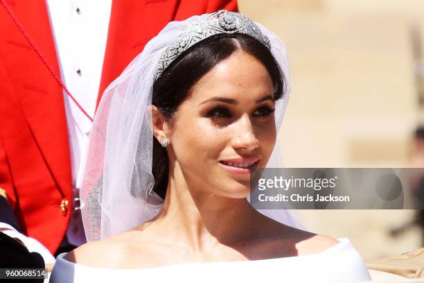 The Duchess of Sussex departs after her wedding to Prince Harry, Duke of Sussex at St George's Chapel, Windsor Castle on May 19, 2018 in Windsor,...