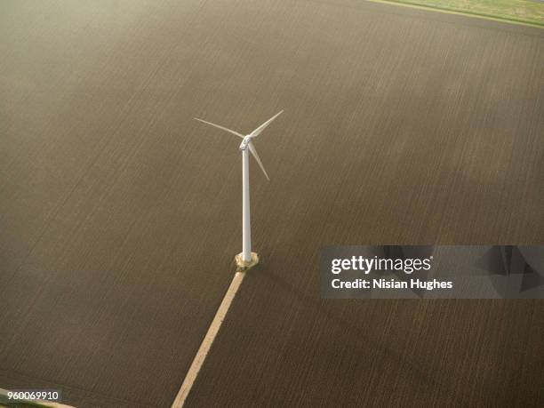 aerial flying over windmill in farmland, netherlands - amsterdam windmill stock pictures, royalty-free photos & images