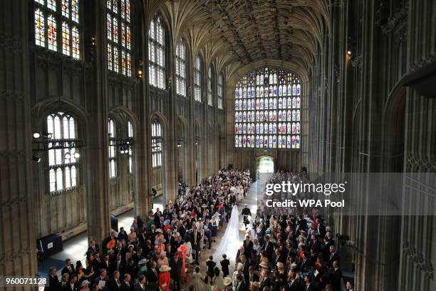 Prince Harry and Meghan Markle leave St George's Chapel in Windsor Castle after their wedding on May 19, 2018 in Windsor, England.