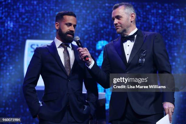 Simon Hill speaks with Alex Brosque during the Sydney FC Sky Ball at The Star on May 19, 2018 in Sydney, Australia.