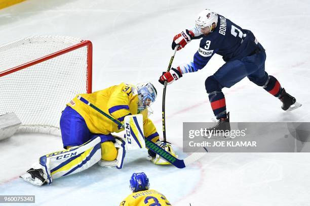 Sweden's goalie Anders Nilsson vies with US Nick Bonino during the semifinal match Sweden vs USA of the 2018 IIHF Ice Hockey World Championship at...