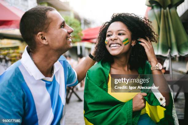 couple brazil argentina - rivalry stock pictures, royalty-free photos & images