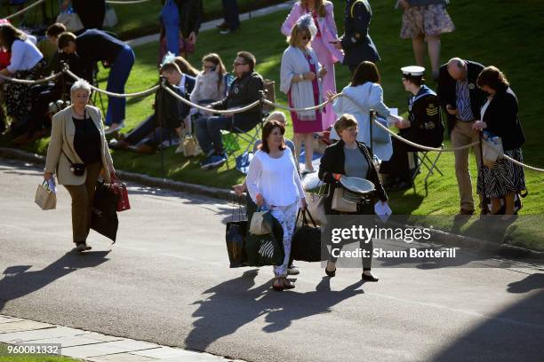 People arrive in preparation for the wedding of Prince Harry to Ms. Meghan Markle St George's Chapel, Windsor Castle on May 19, 2018 in Windsor,...
