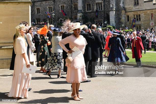 Oprah Winfrey leaves St George's Chapel at Windsor Castle after the wedding of Meghan Markle and Prince Harry on May 19, 2018 in Windsor, England.