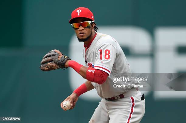 Pedro Florimon of the Philadelphia Phillies throws the ball to first base against the Washington Nationals at Nationals Park on May 6, 2018 in...