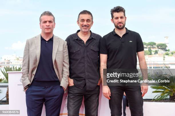 Murat Cemcir, Director Nuri Bilge Ceylan and Aydin Dogu Demirkol attend "Ahlat Agaci" Photocall during the 71st annual Cannes Film Festival at Palais...