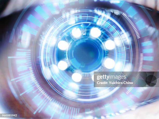 artificial intelligence digital screen over the eye - augen verbunden stock-fotos und bilder