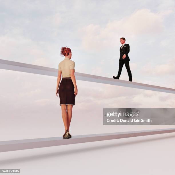 gender inequality: man and woman on separate paths - bias stock-fotos und bilder