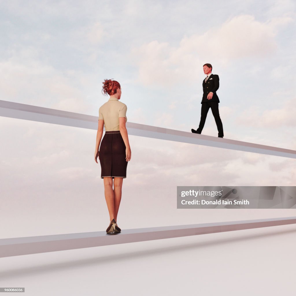 Gender inequality: man and woman on separate paths