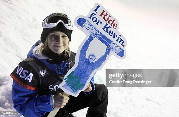 Ellery Hollingsworth holds a sign in support of fellow snowboarder Kevin Pearce as she finished third in the US Snowboarding Grand Prix on January...